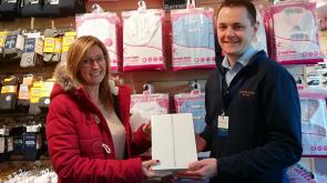 iPad Survey Winner Collects Prize